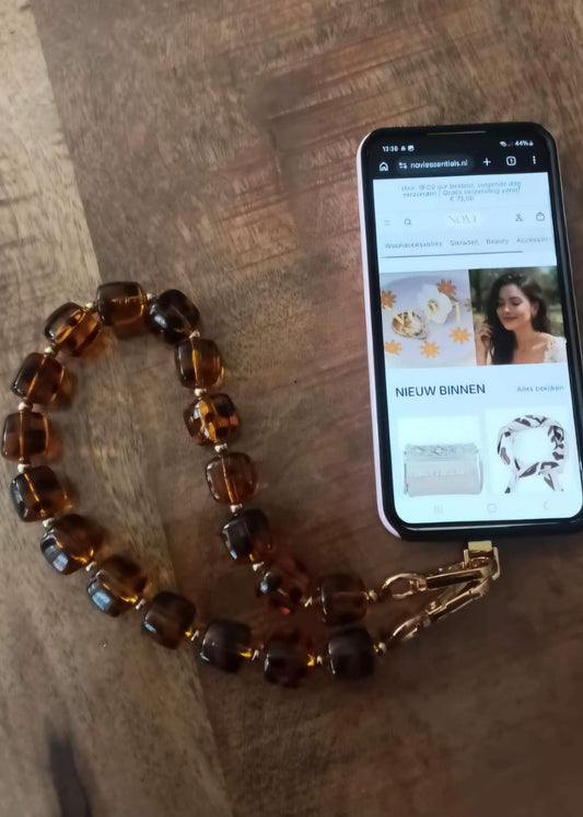 Telefoonkoord met bruine tijgerprint kralen en goudkleurige sluiting